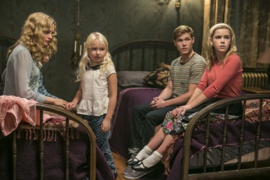 Heather Graham as Corrine, Ava Telek as Carrie, Mason Dye as Christopher and Kiernan Shipka as Cathy in FLOWERS IN THE ATTIC (Image Credit: James Dittiger/Lifetime)